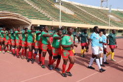 Pre game walkout of Burundi and Cameroon men's teams with Societe Generale .JPG